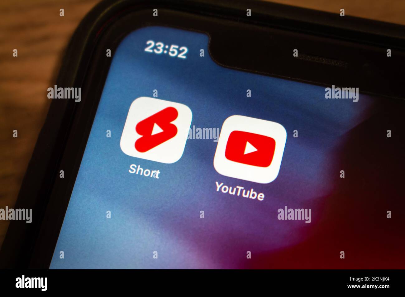 Vancouver, CANADA - Sep 27 2022 : Closeup icons YouTube Shorts and YouTube app on an iPhone in dark mood. Short video social networking concept. Stock Photo
