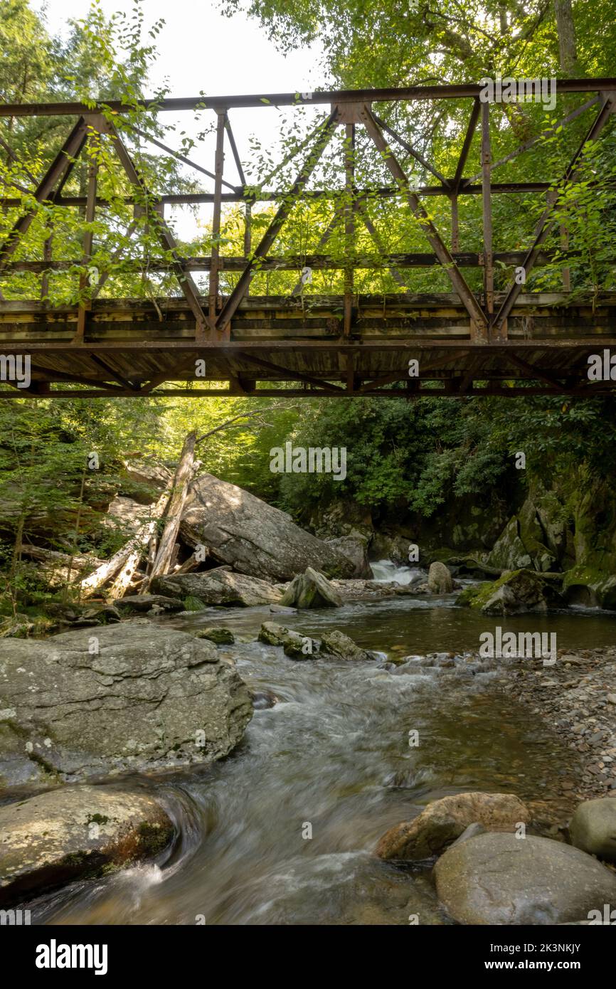 Water Flowing Under Enloe Creek Bridge in Great Smoky Mountains National Park Stock Photo