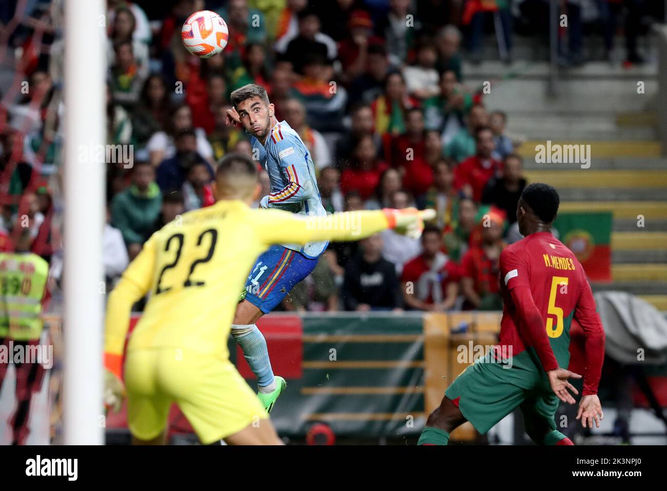 Lisbon, Portugal. 27th Sep, 2022. Ferran Torres (C) of Spain heads the ball during the League A Group 2 match against Portugal at the 2022 UEFA Nations League in Lisbon, Portugal, Sept. 27, 2022. Credit: Pedro Fiuza/Xinhua/Alamy Live News Stock Photo