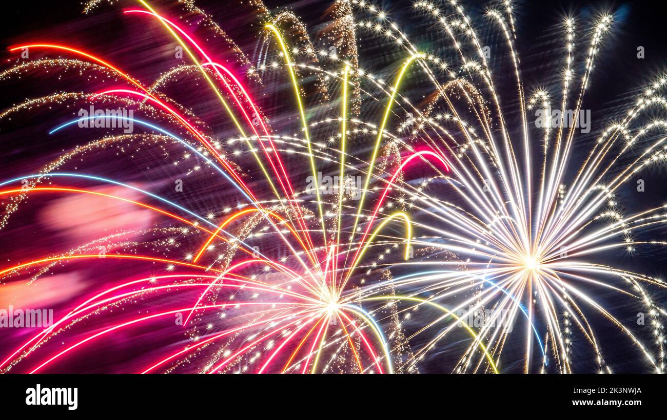 The beautiful colorful firework in the night sky Stock Photo - Alamy