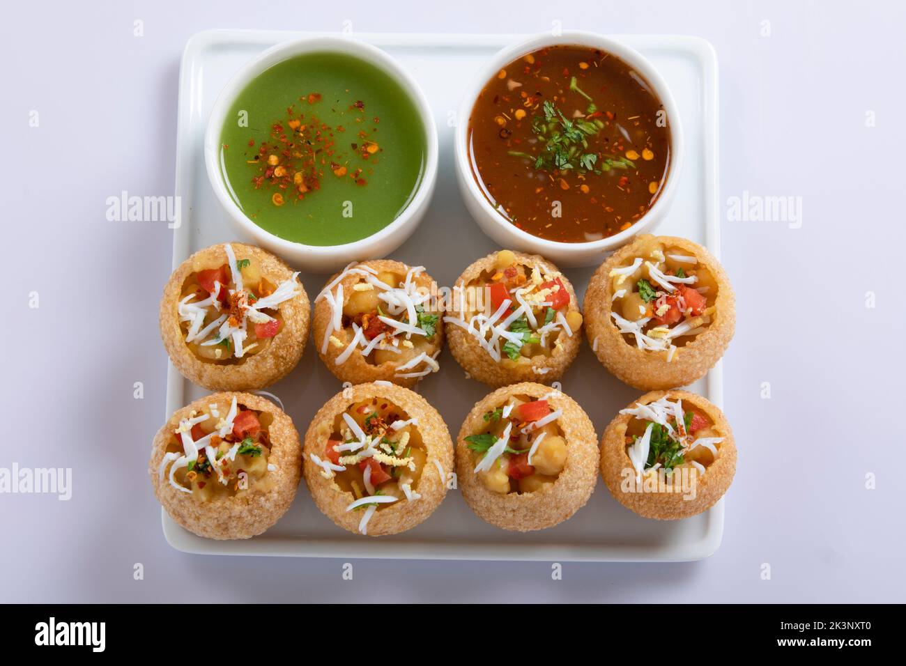 Panipuri or fuchka fhuchka or gupchup or golgappa or Pani ke Patake is a type of snack that originated in the Indian subcontinent Stock Photo