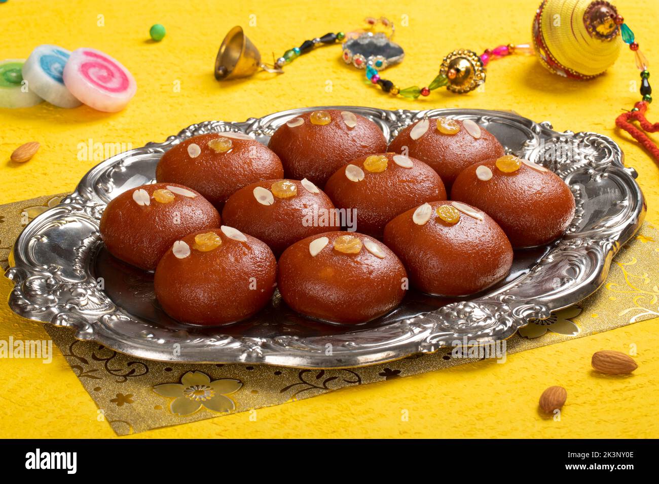 Gulab jamun is a milk-solid-based sweet dumpling popular in India, pakistan in festivals like Diwali, eid or even wedding parties Stock Photo