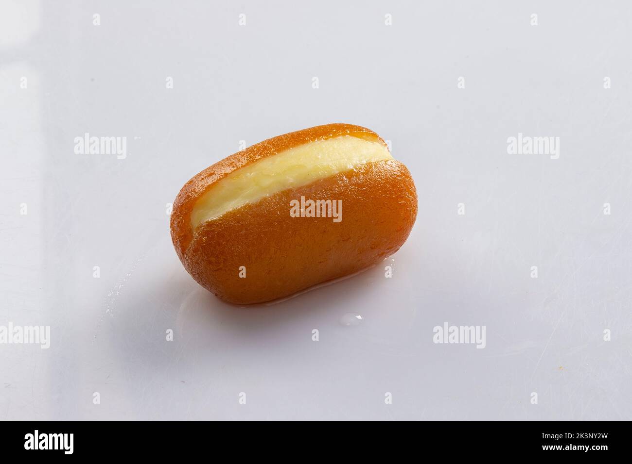 Gulab jamun is a milk-solid-based sweet dumpling popular in India, pakistan in festivals like Diwali, eid or even wedding parties Stock Photo