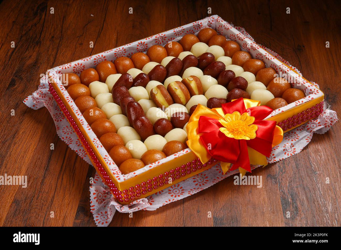 Gulab jamun is a milk-solid-based sweet dumpling popular in India, pakistan in festivals like Diwali, eid or even wedding parties Stock Photo