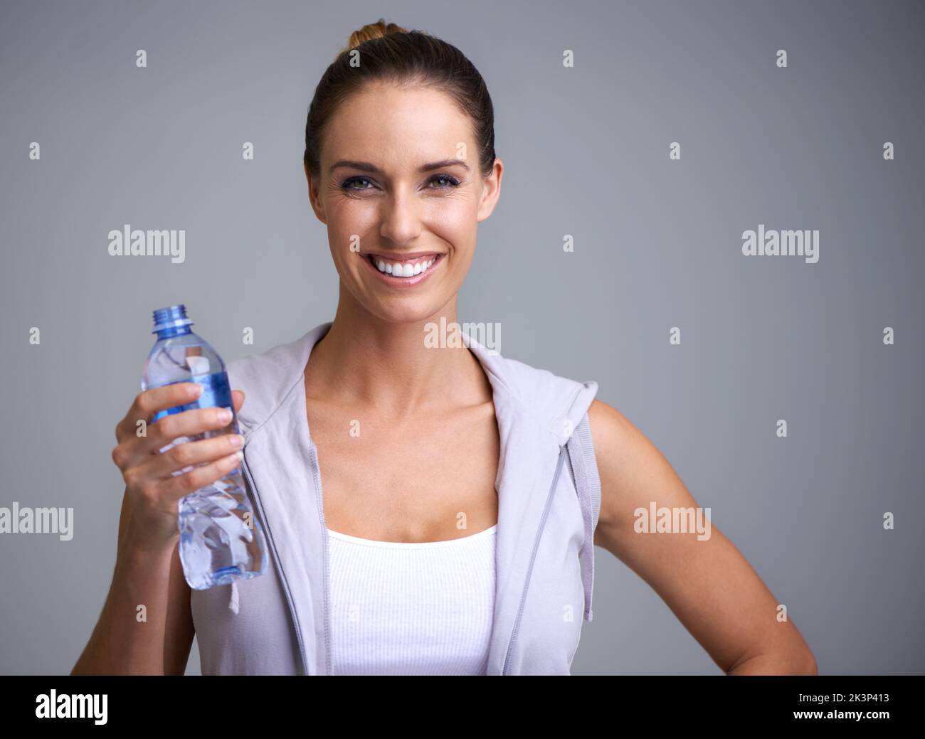 Hydration is key. Portrait of an attractive young woman holding a