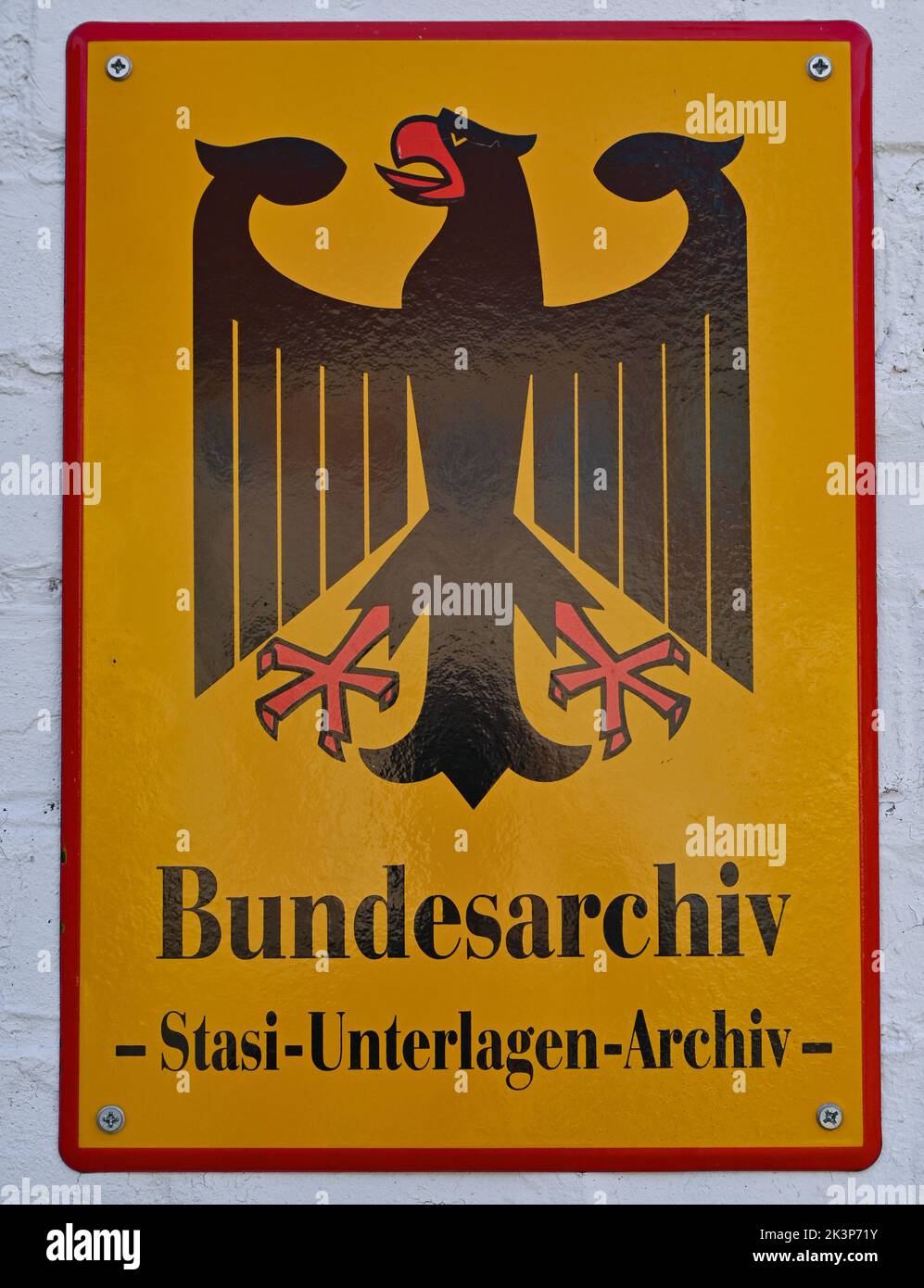 Cottbus, Germany. 23rd Sep, 2022. A sign with the federal eagle 'Bundesarchiv Stasi-Unterlagen-Archiv' on a wall of the Cottbus Prison Memorial by the association Menschenrechtszentrum Cottbus e.V. (to dpa ''You always think of prison' - ex-prisoners back at the place of injustice') Credit: Patrick Pleul/dpa/Alamy Live News Stock Photo
