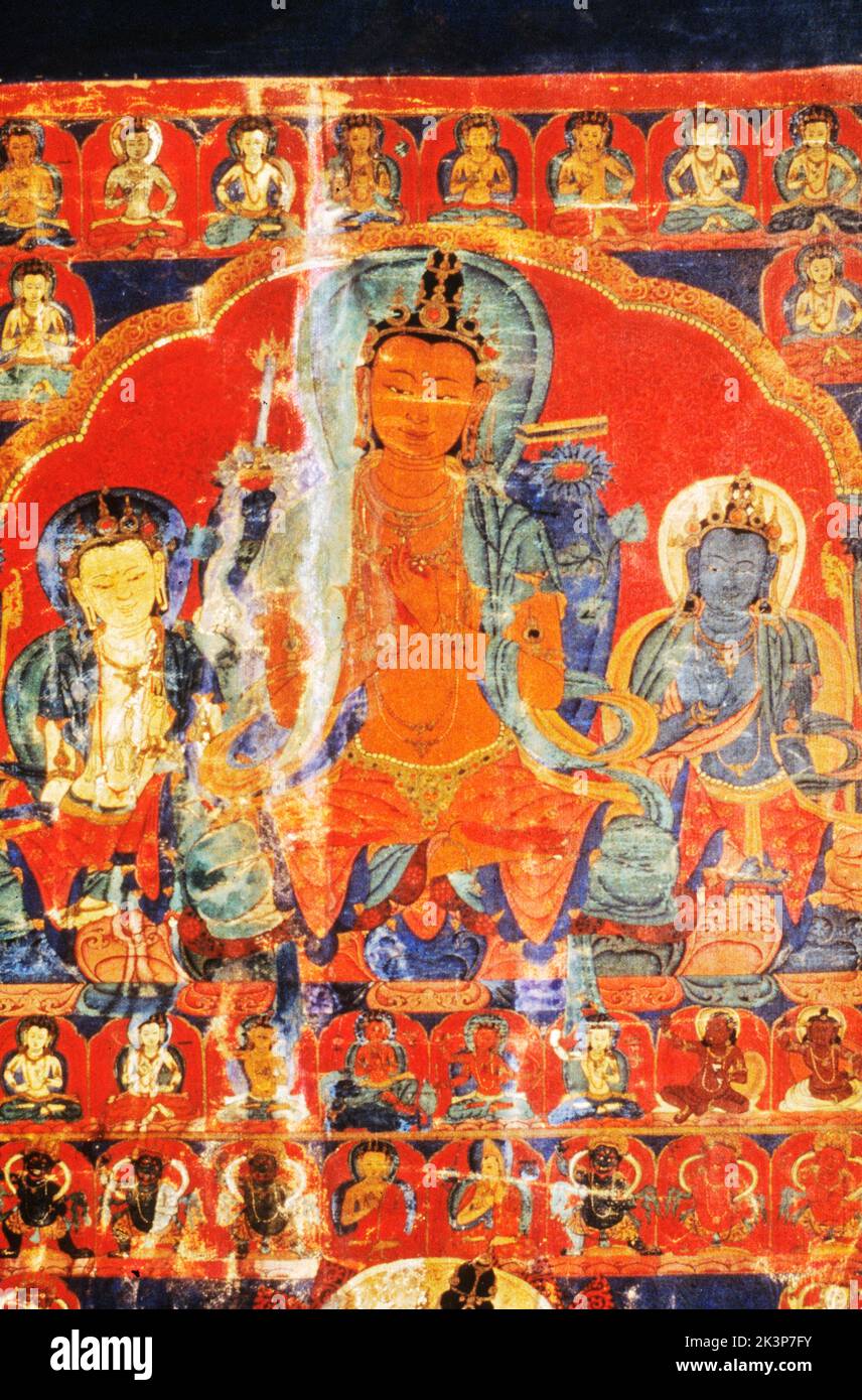 Thangka, Tibetan Buddhist painting,  Details of Majusri in Dhamacakra mudra, at upper right Guge style, 16th century Ladakh, India Stock Photo