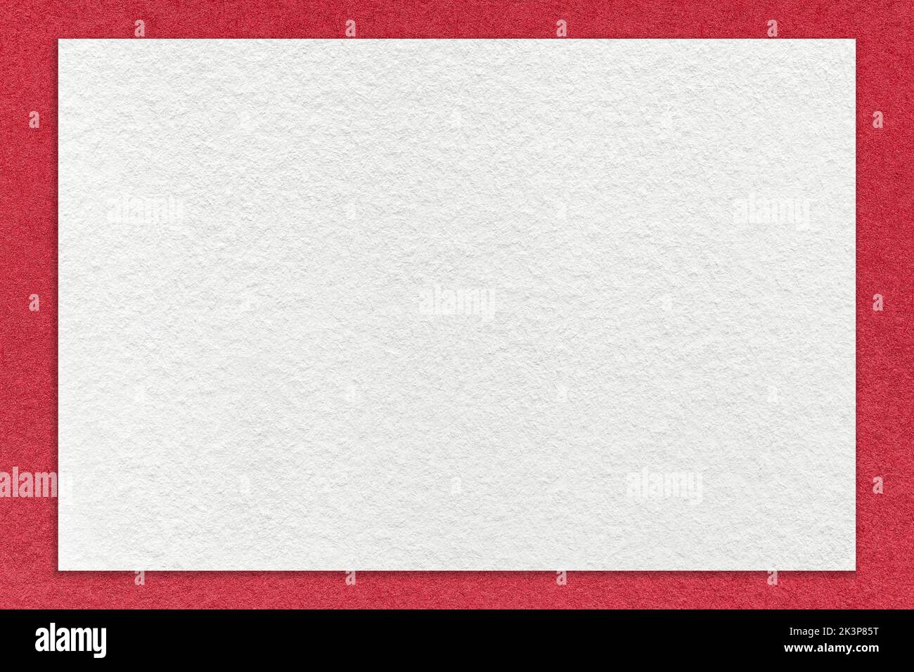 Texture of craft white color paper background with red border, macro ...