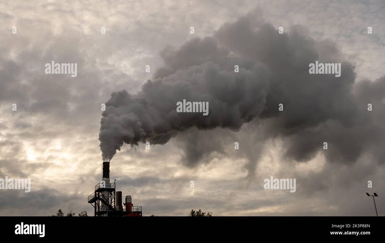 Smoking chimneys of a chemical plant emitting huge amounts of