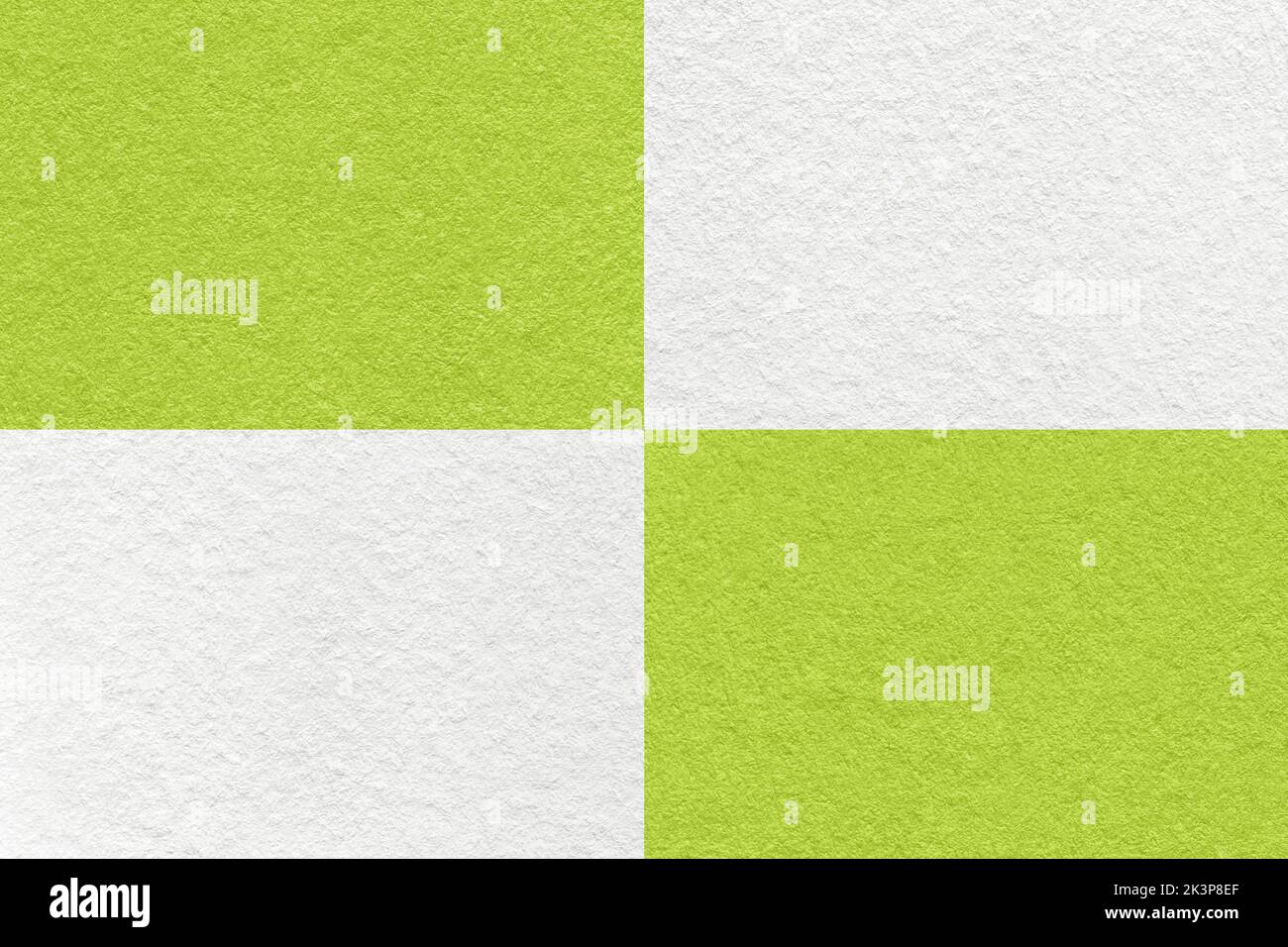 Texture of craft white and green paper background with cells pattern