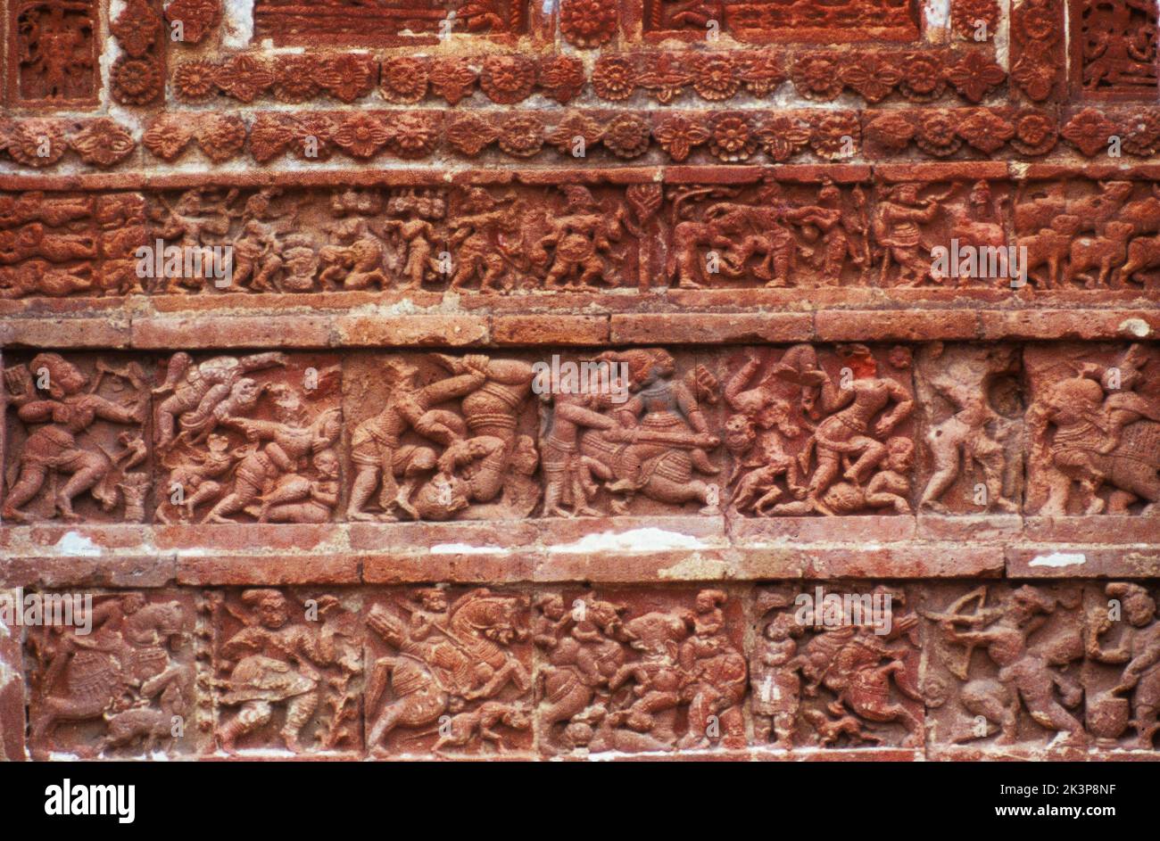 India: Bishnupur Keshtaraya temple, South of entrance, with Krishna stories at base Stock Photo