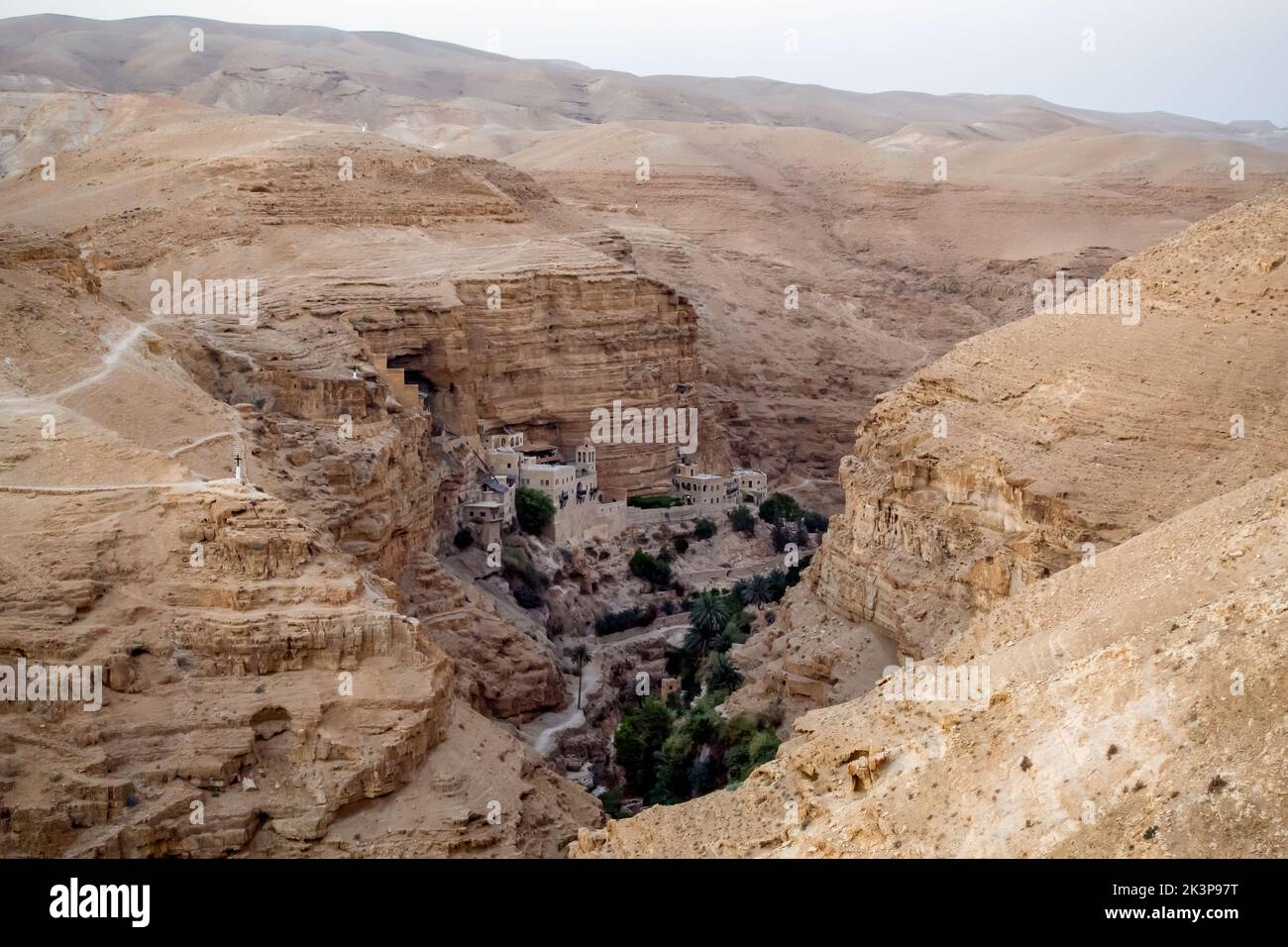 The Monastery of St George of Koziba, nestled in the lush valley of the Wadi Qelt, Judaean or Judean desert in Israel Stock Photo