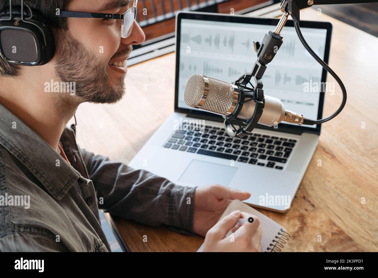 Podcaster Using A Microphone Close up influencer using microphone hi-res stock photography and ...