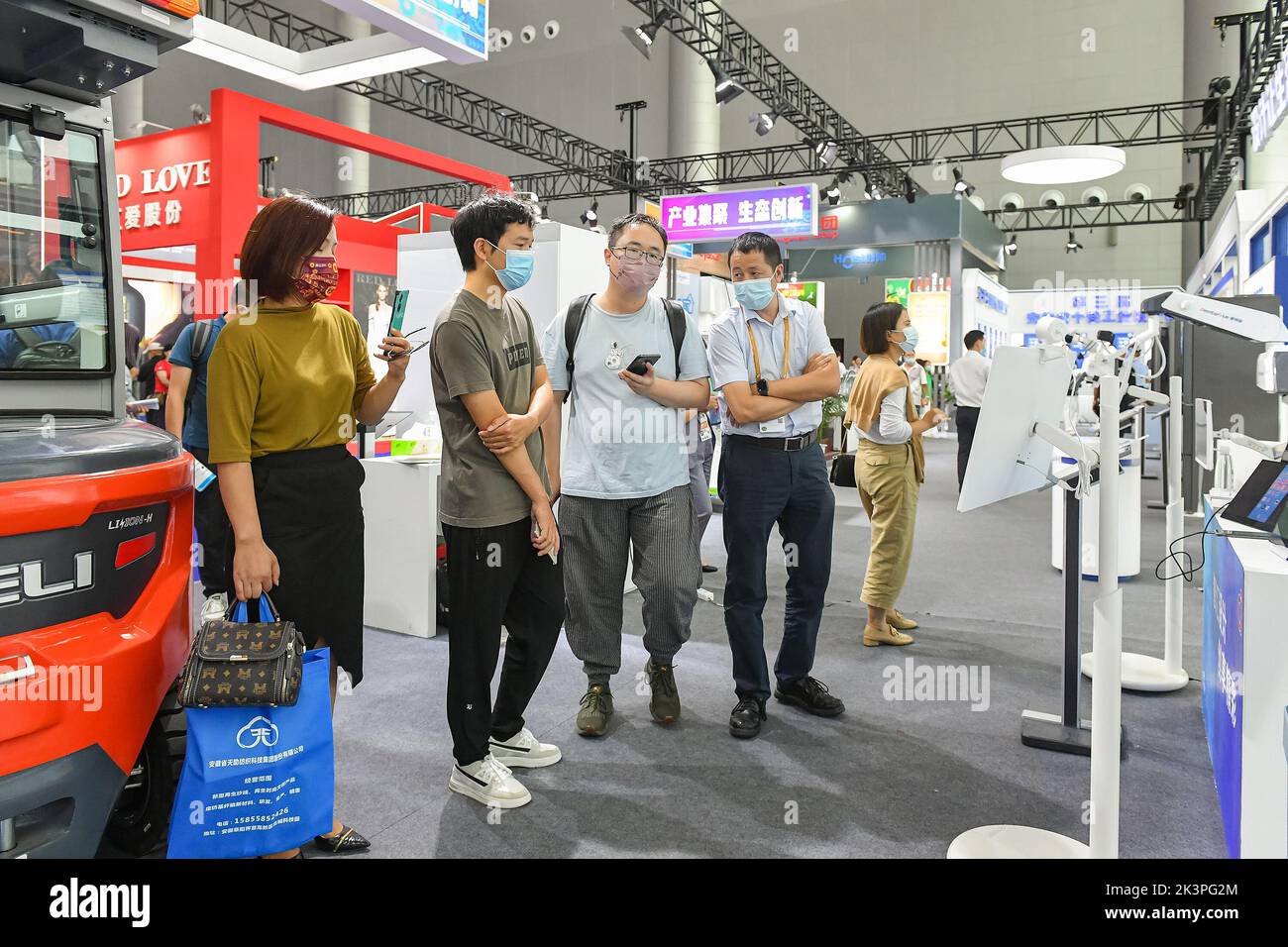 HEFEI, CHINA - SEPTEMBER 21, 2022 - Visitors visit the industrial design exhibition area at the Integrated Pavilion of the World Manufacturing Congres Stock Photo