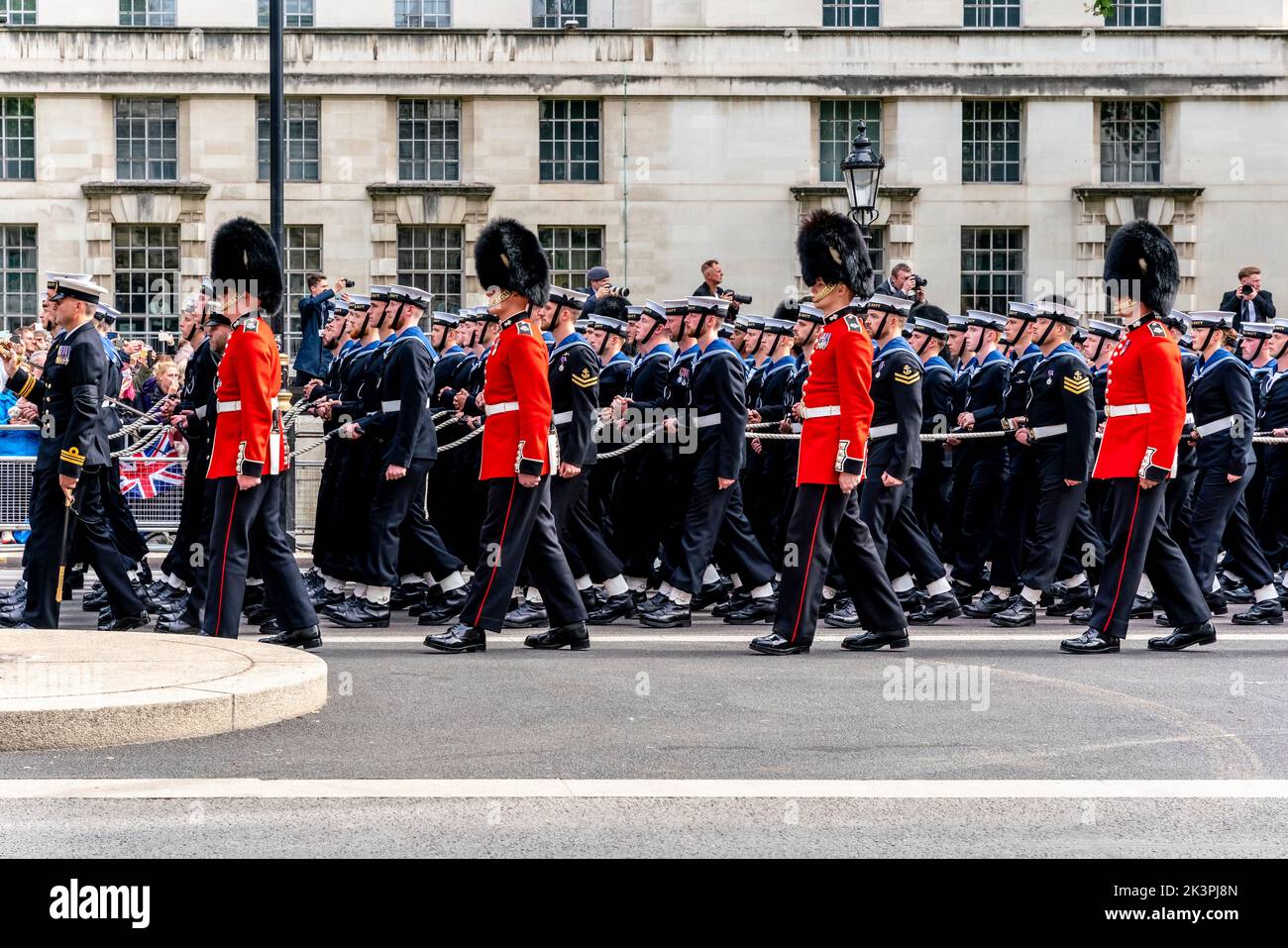 Naval Ratings Pull The State Gun Carriage and Coffin As Part Of The Funeral Procession Of Queen Elizabeth II, Whitehall, London, UK. Stock Photo