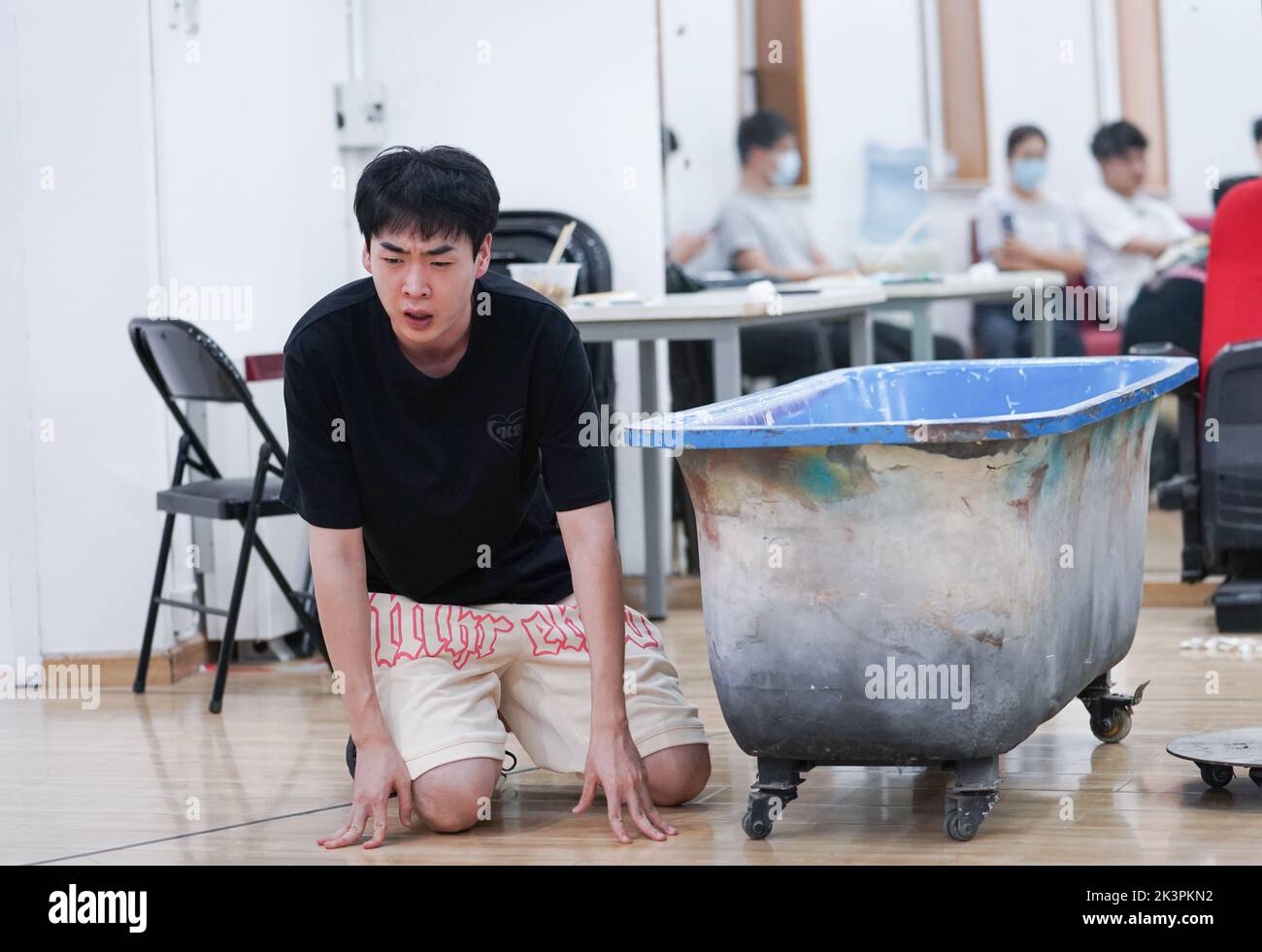 Beijing, China. 13th Sep, 2022. Wang Guang rehearses an avant-garde drama in the rehearsal room of Star Theater in Beijing, capital of China, Sept. 13, 2022. TO GO WITH 'Across China: Beijing hutong theater dedicated to avant-garde dramas' Credit: Chen Zhonghao/Xinhua/Alamy Live News Stock Photo