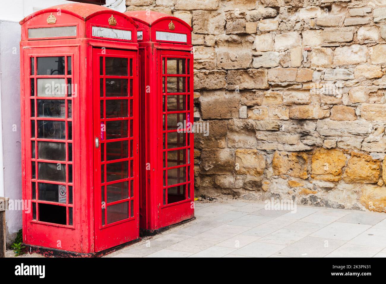 Southampton, United Kingdom - April 23, 2019: Two K6 telephone boxes stand on the street Stock Photo