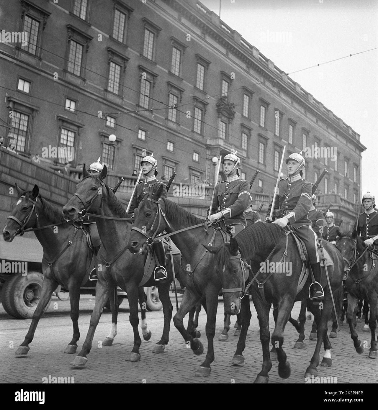 Changing of the guards in the 1940s. The guards riding outside the royal castle in Stockholm to take their turn in guarding the palace. Sweden 1947 Kristoffersson ref AD32-8 Stock Photo