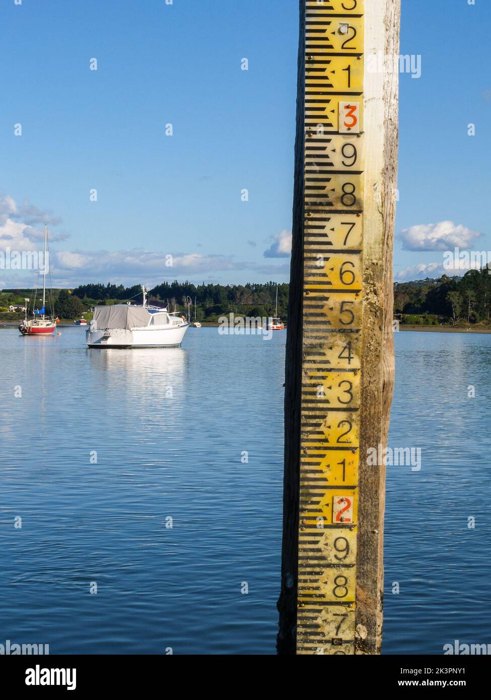 Sea tide depth measure in bay at Omokoroa, Tauranga New Zealand Stock