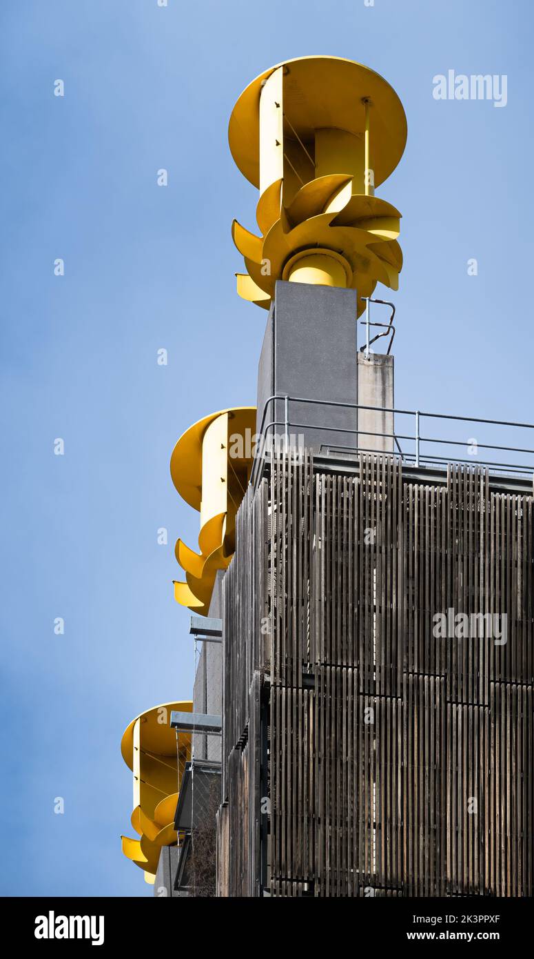 Melbourne, Victoria, Australia - Council House 2 building by Mick Pearce and DesignInc, yellow wind turbines on roof Stock Photo