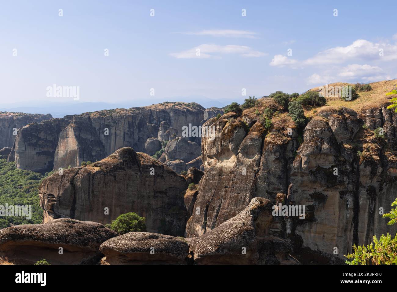 The structure on the face of the monoliths in this image is evidence of water-borne sediment being deposited in sequences. Meteora, Central Greece Stock Photo
