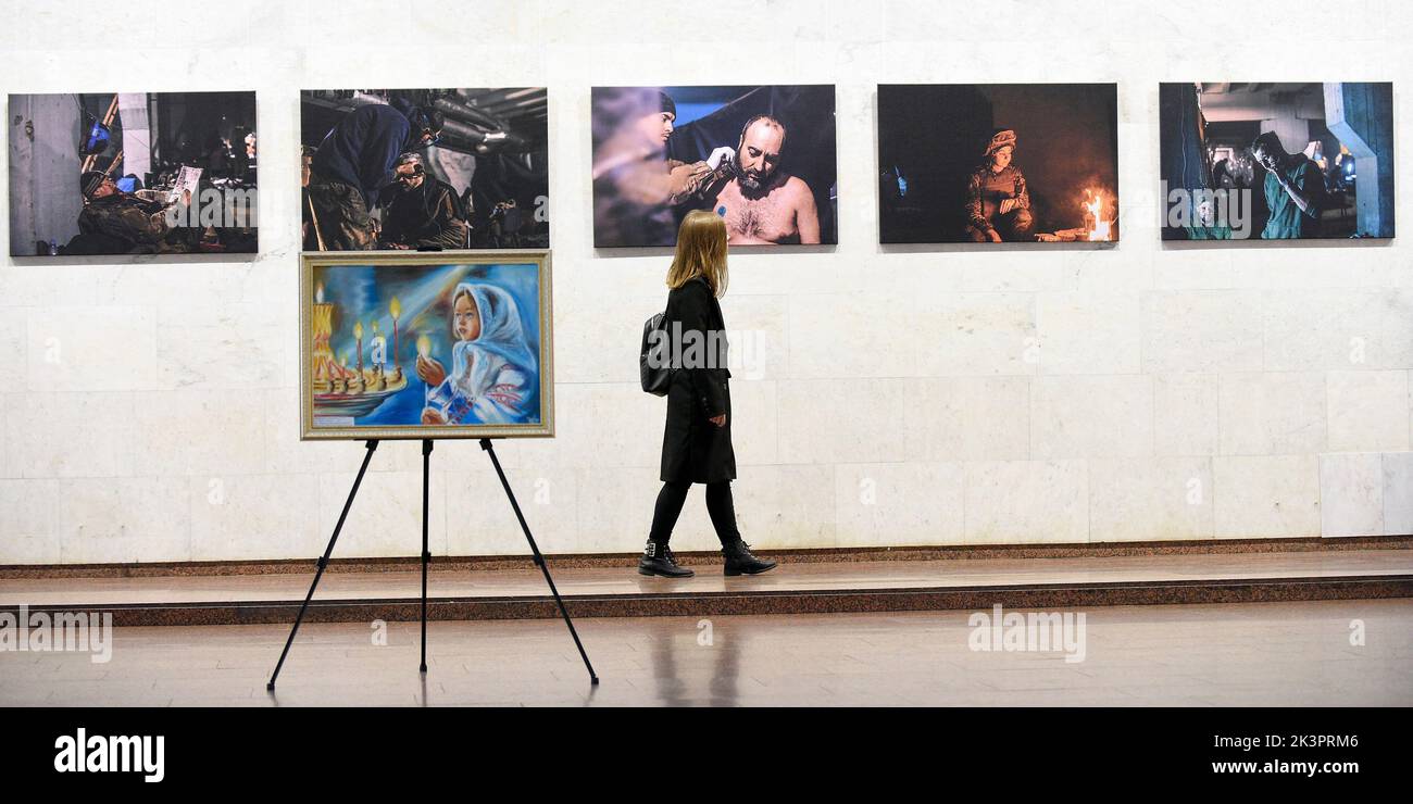 KYIV, UKRAINE - SEPTEMBER 27, 2022 - A visitor looks at exhibits during the WHERE ARE YOU? charity auction at the Ukrainian House held in celebration Stock Photo
