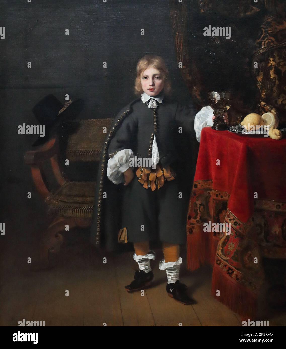 Portrait of a Boy aged 8 by Dutch painter Ferdinand Bol at the National Gallery, London, UK Stock Photo