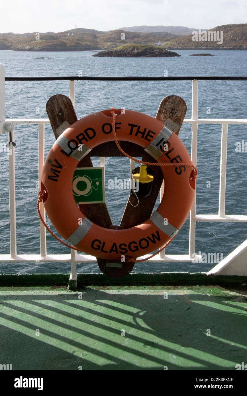 A lifebelt on the CalMac Ferry from Tarbert on Harris to the Isle of Skye, Hebrides, Scotland, UK Stock Photo