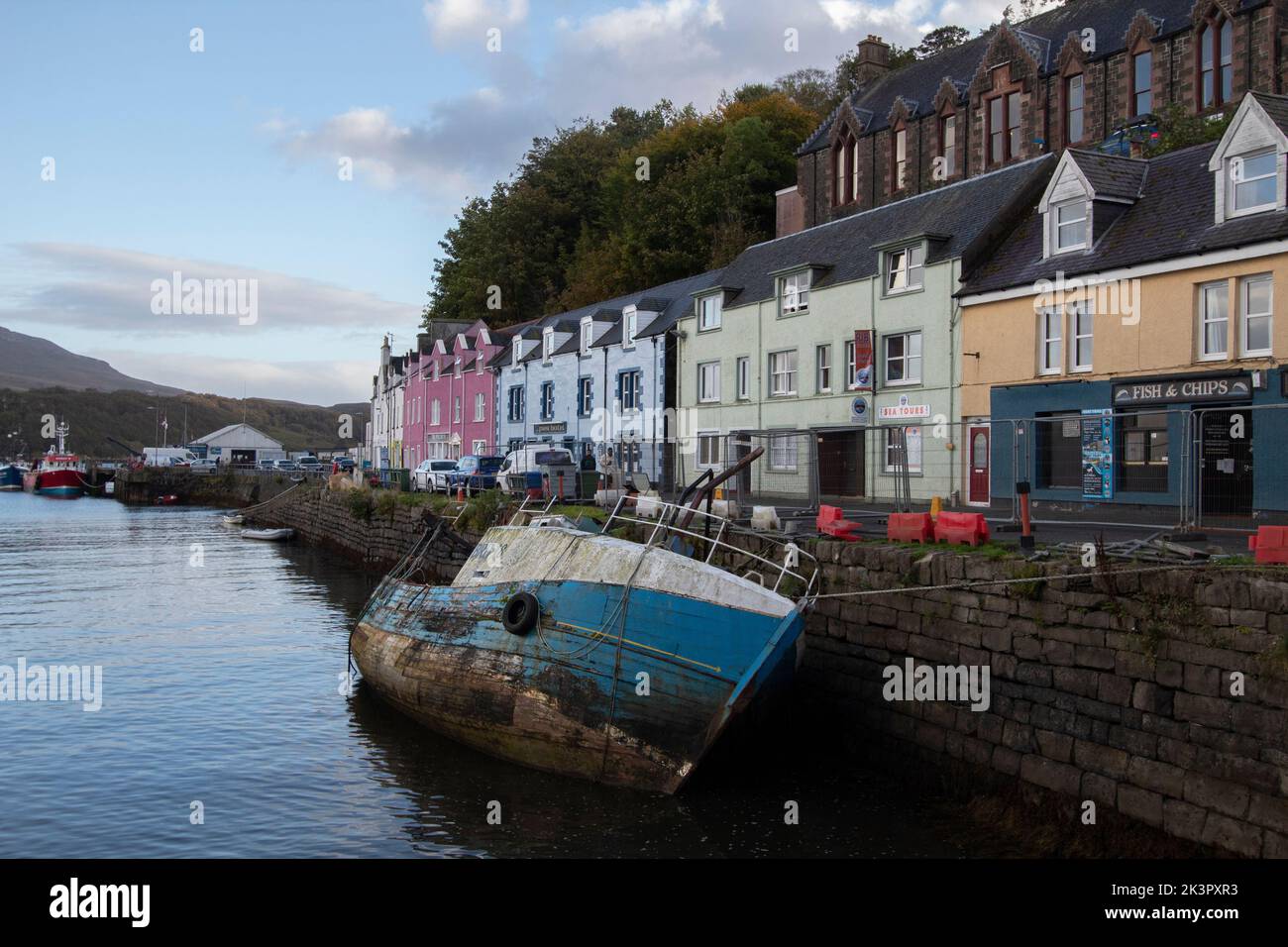 Row of rainbow coloured houses near the harbour at Portree, Isle of Skye, Inner Hebrides, Scotland, UK Stock Photo