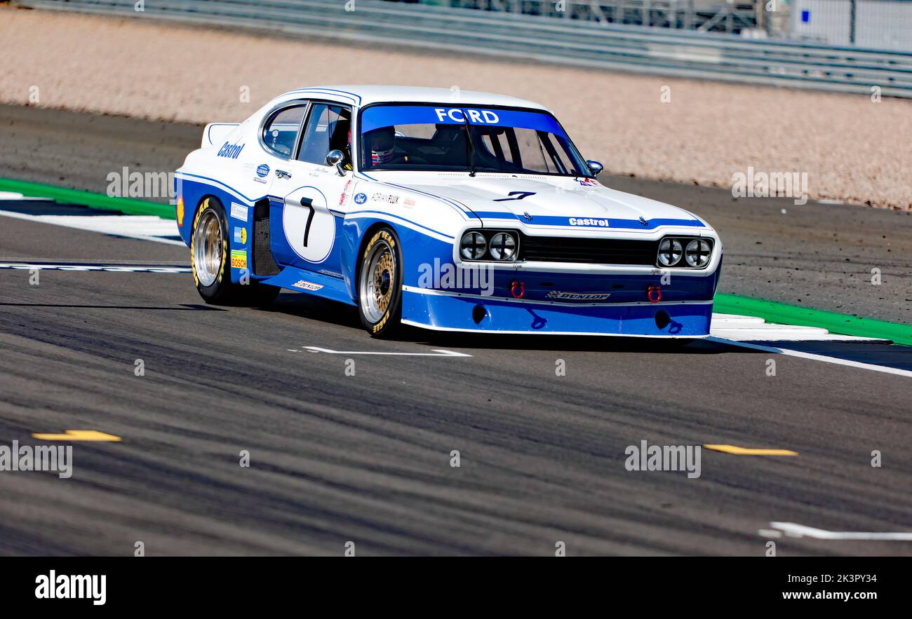 The Blue and White 1975, Ford Capri RS3100, of Gary Pearson and Alex Brundle, competing in the Tony Dron Memorial Trophy for MRL Historic Touring Cars. Stock Photo