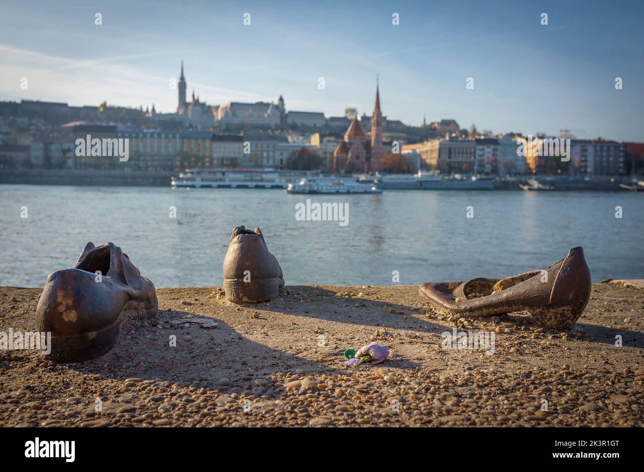 The Iron shoes memorial for Jewish people executed during the WW2 in Budapest in front of a river Stock Photo