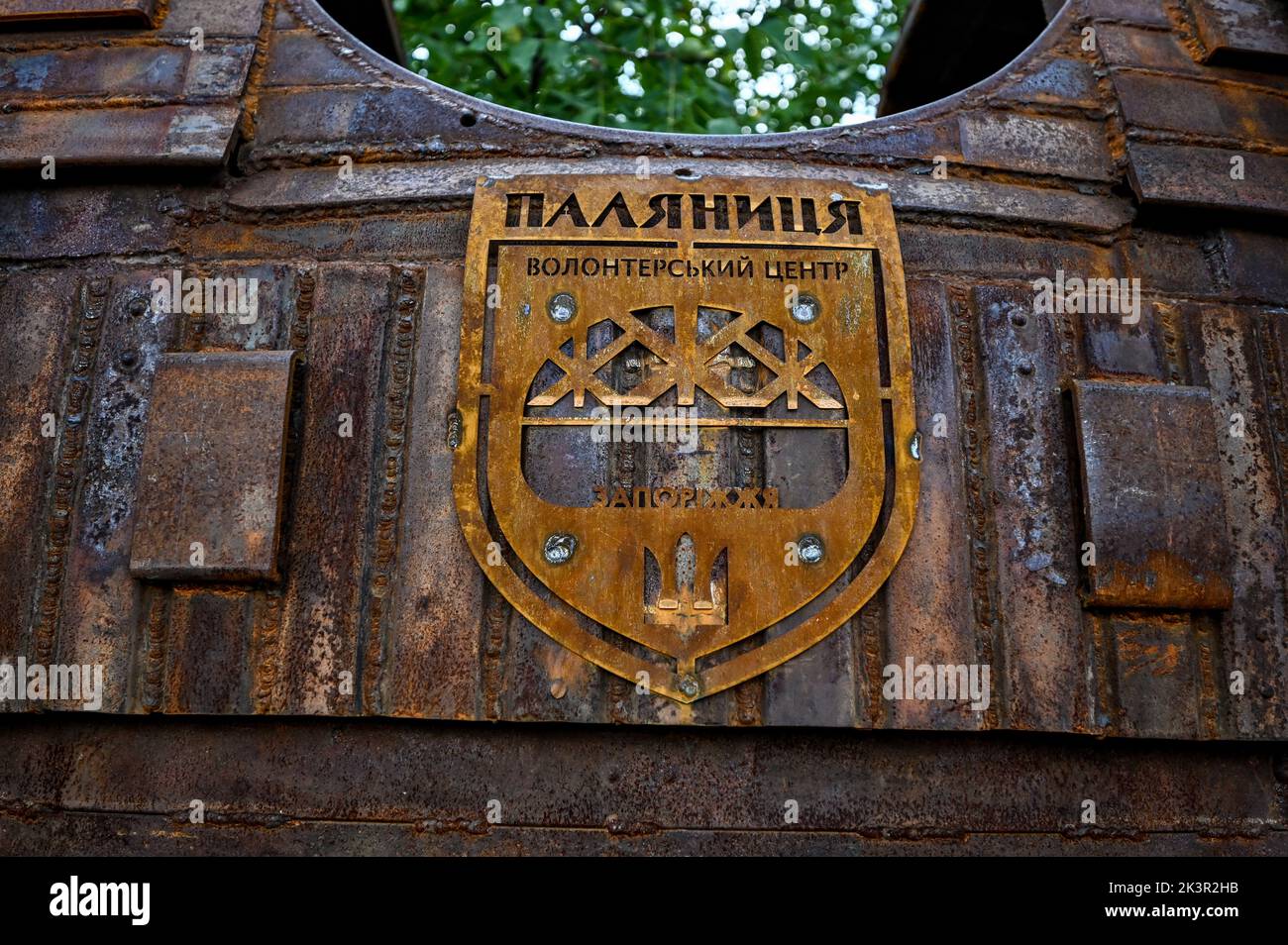 ZAPORIZHZHIA, UKRAINE - SEPTEMBER 13, 2022 - The logo of the Palianytsia volunteer centre is attached to the 2.5-tonne monument to the bulletproof ves Stock Photo