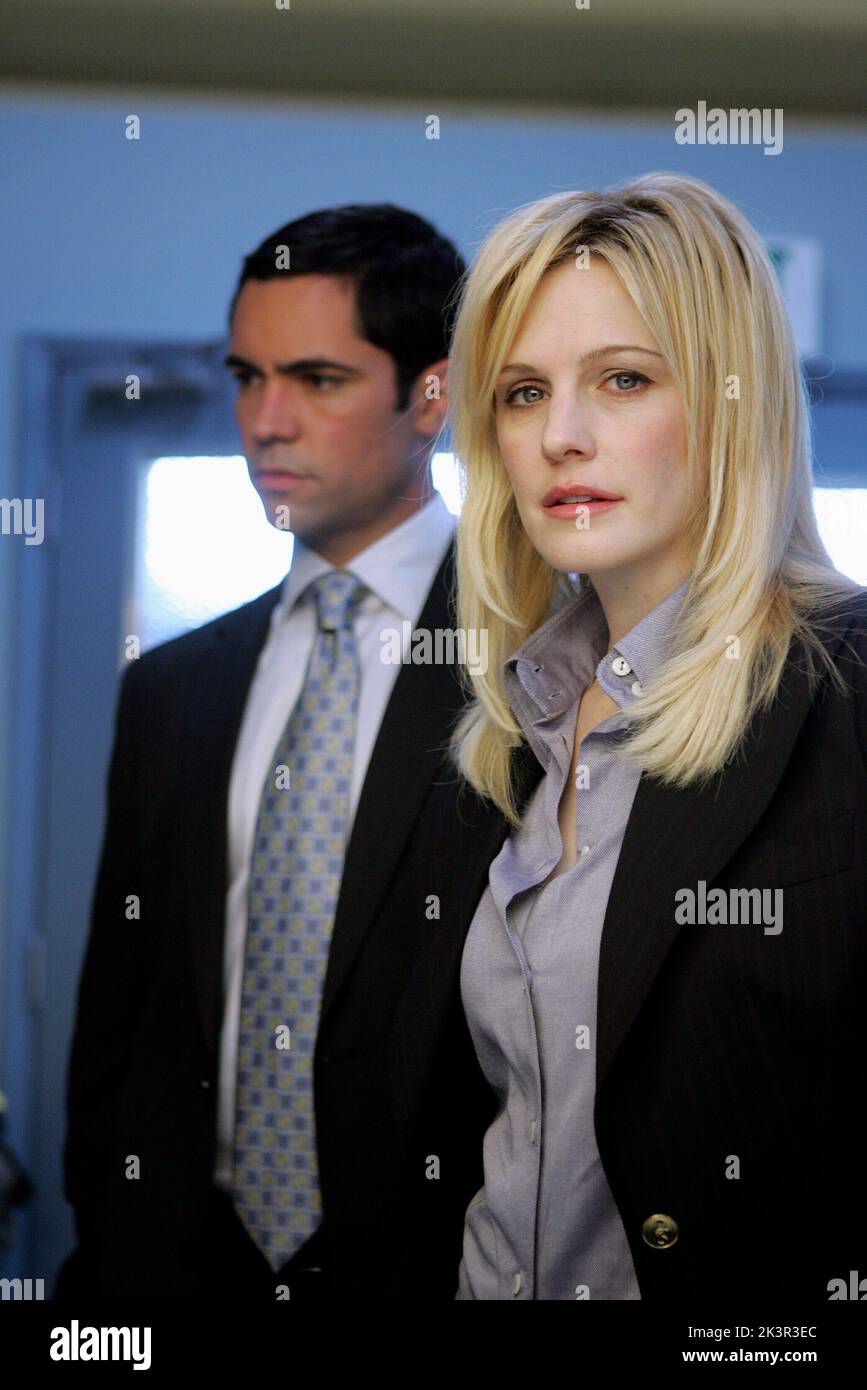 Danny Pino & Kathryn Morris Television: Cold Case : Season 3 (2005) Characters: Scotty Valens & Lilly Rush  25 September 2005   **WARNING** This Photograph is for editorial use only and is the copyright of CBS TELEVISION and/or the Photographer assigned by the Film or Production Company and can only be reproduced by publications in conjunction with the promotion of the above Film. A Mandatory Credit To CBS TELEVISION is required. The Photographer should also be credited when known. No commercial use can be granted without written authority from the Film Company. Stock Photo