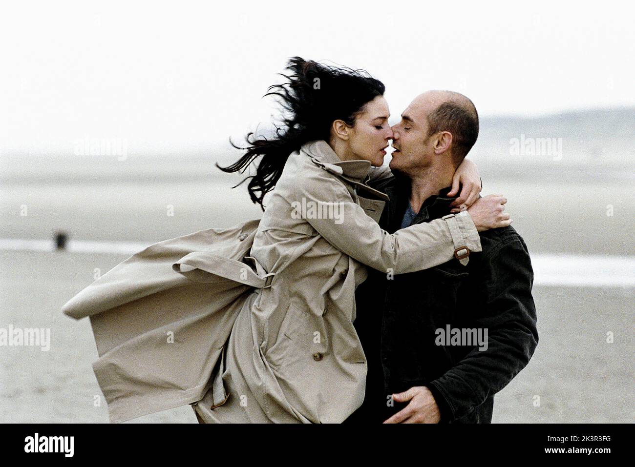 Monica Bellucci & Bertrand Blier Film: Combien Tu M'Aimes? (2005) Characters: Daniela & Le client de Muguet (uncredited)  Director: Bertrand Blier 26 October 2005   **WARNING** This Photograph is for editorial use only and is the copyright of TPS STAR and/or the Photographer assigned by the Film or Production Company and can only be reproduced by publications in conjunction with the promotion of the above Film. A Mandatory Credit To TPS STAR is required. The Photographer should also be credited when known. No commercial use can be granted without written authority from the Film Company. Stock Photo
