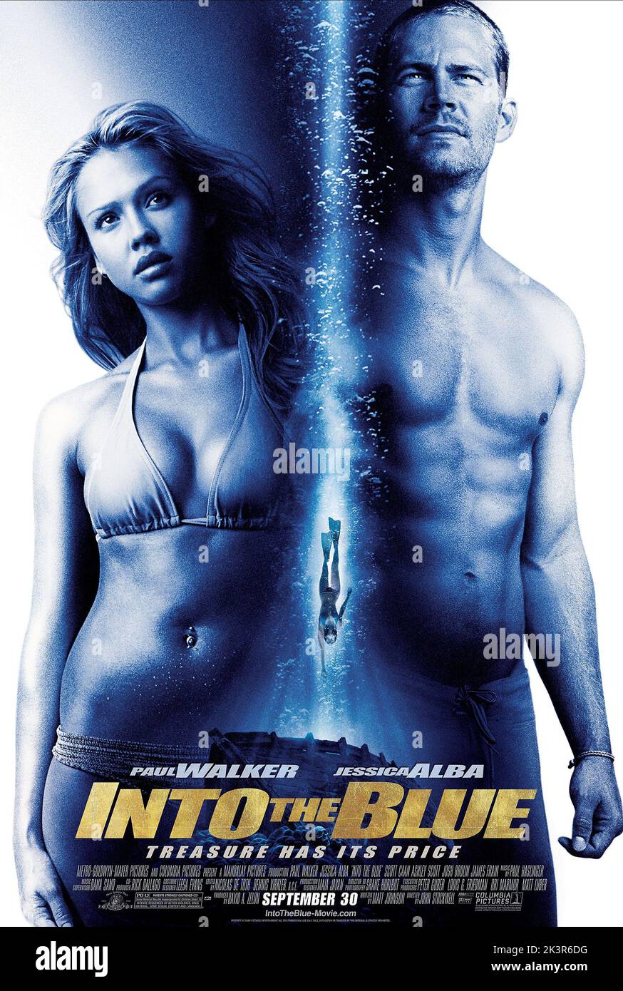 Jessica Alba & Paul Walker Poster Film: Into The Blue (USA 2005) Characters: Sam, Jared  Director: John Stockwell 30 September 2005   **WARNING** This Photograph is for editorial use only and is the copyright of MGM and/or the Photographer assigned by the Film or Production Company and can only be reproduced by publications in conjunction with the promotion of the above Film. A Mandatory Credit To MGM is required. The Photographer should also be credited when known. No commercial use can be granted without written authority from the Film Company. Stock Photo