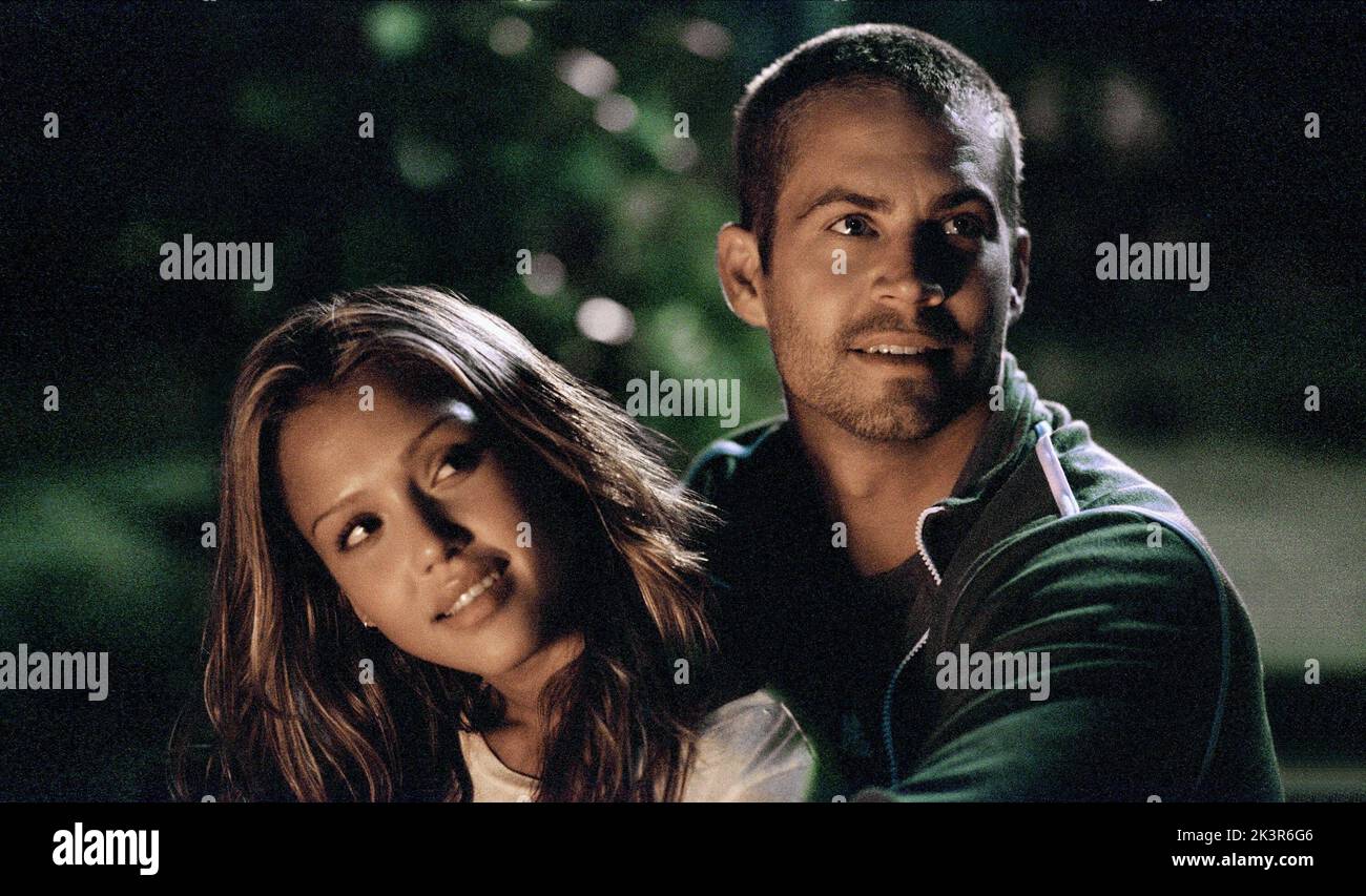 Jessica Alba & Paul Walker Film: Into The Blue (USA 2005) Characters: Sam & Jared  Director: John Stockwell 30 September 2005   **WARNING** This Photograph is for editorial use only and is the copyright of MGM and/or the Photographer assigned by the Film or Production Company and can only be reproduced by publications in conjunction with the promotion of the above Film. A Mandatory Credit To MGM is required. The Photographer should also be credited when known. No commercial use can be granted without written authority from the Film Company. Stock Photo