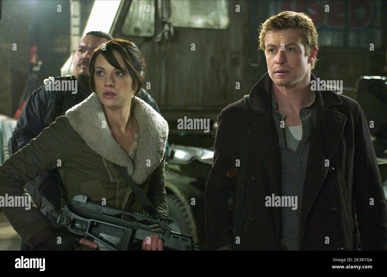 Asia Argento & Simon Baker Film: Land Of The Dead (USA/CAN/FR 2005) Characters: Slack & Riley  Director: George A. Romero 18 June 2005   **WARNING** This Photograph is for editorial use only and is the copyright of UNIVERSAL PICTURES and/or the Photographer assigned by the Film or Production Company and can only be reproduced by publications in conjunction with the promotion of the above Film. A Mandatory Credit To UNIVERSAL PICTURES is required. The Photographer should also be credited when known. No commercial use can be granted without written authority from the Film Company. Stock Photo
