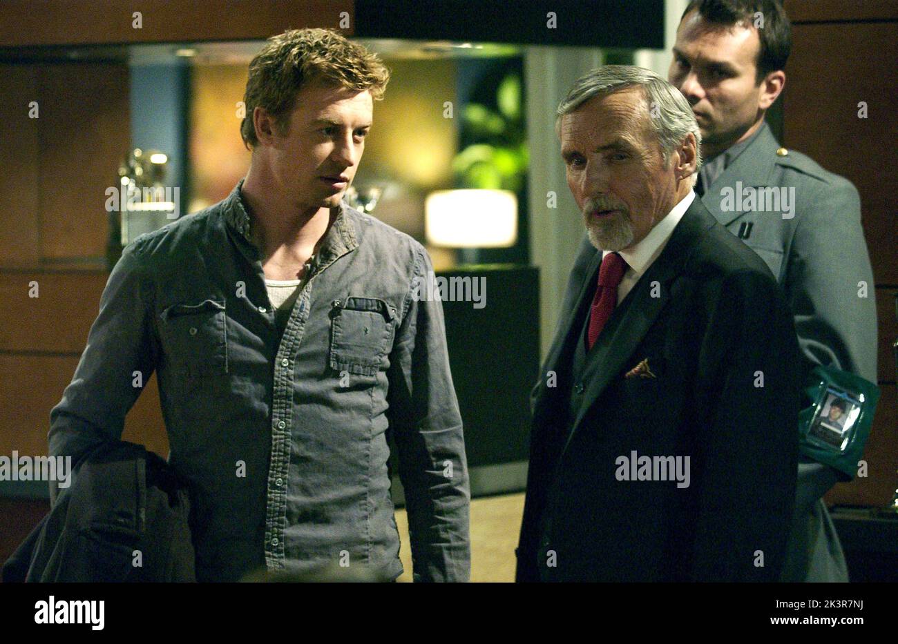 Simon Baker & Dennis Hopper Film: Land Of The Dead (USA/CAN/FR 2005) Characters: Riley & Kaufman  Director: George A. Romero 18 June 2005   **WARNING** This Photograph is for editorial use only and is the copyright of UNIVERSAL PICTURES and/or the Photographer assigned by the Film or Production Company and can only be reproduced by publications in conjunction with the promotion of the above Film. A Mandatory Credit To UNIVERSAL PICTURES is required. The Photographer should also be credited when known. No commercial use can be granted without written authority from the Film Company. Stock Photo