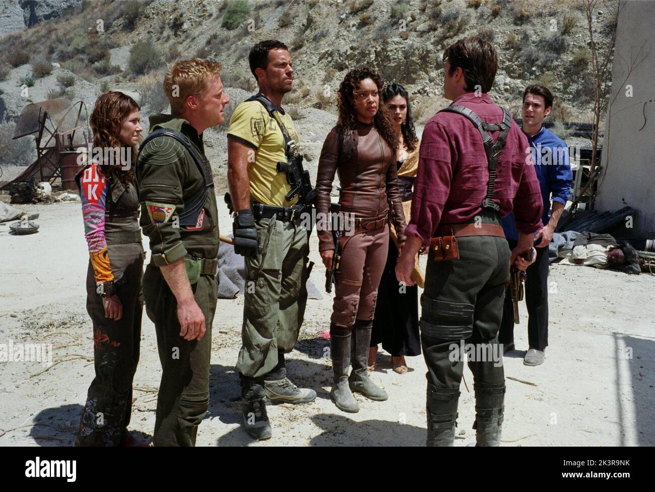 Jewel Staite, Alan Tudyk, Adam Baldwin, Gina Torres, Morena Baccarin, Nathan Fillion & Sean Maher Film: Serenity (USA 2005) Characters: Kaylee,Wash,Jayne,Zoe,Inara,Mal & Simon  Director: Joss Whedon 22 September 2005   **WARNING** This Photograph is for editorial use only and is the copyright of UNIVERSAL PICTURES and/or the Photographer assigned by the Film or Production Company and can only be reproduced by publications in conjunction with the promotion of the above Film. A Mandatory Credit To UNIVERSAL PICTURES is required. The Photographer should also be credited when known. No commercial Stock Photo