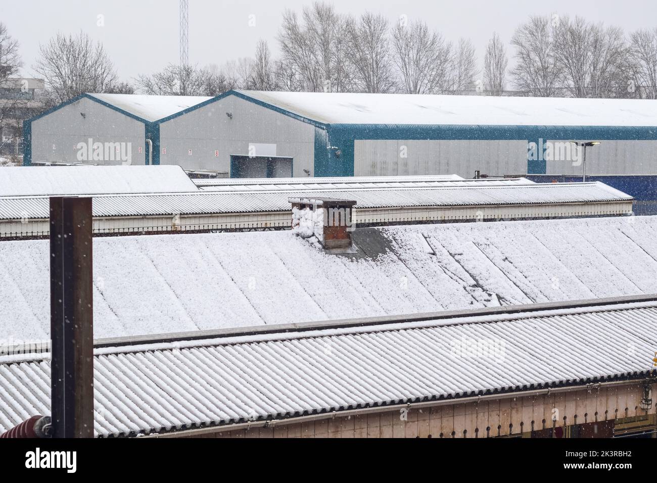 Winter snow, warehouses and railway station Welwyn Garden City in Hertfordshire, England Stock Photo