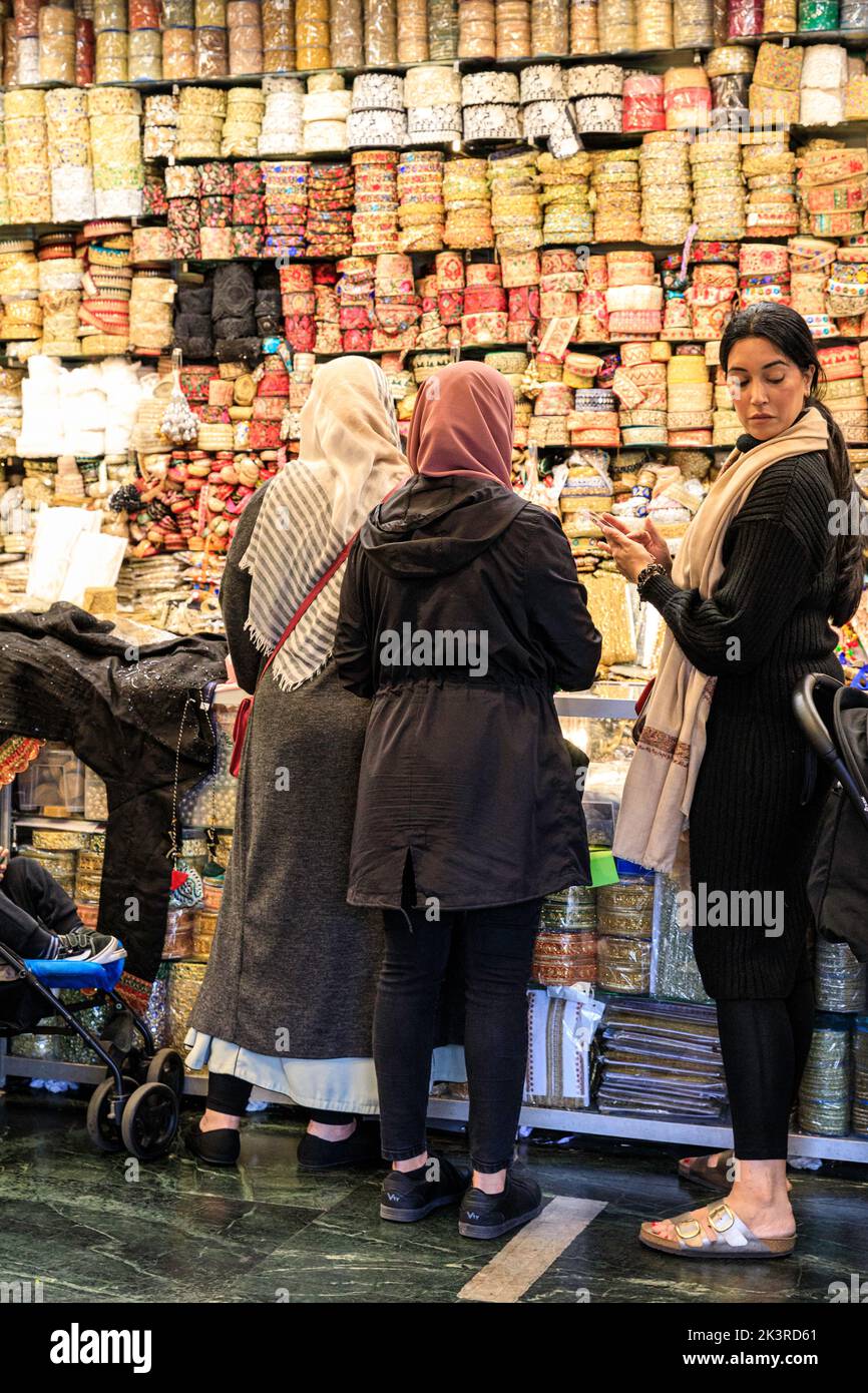 Punjabi, Indian and Asian shops and people shopping in Southall High Street, Southall, West London, England, UK Stock Photo