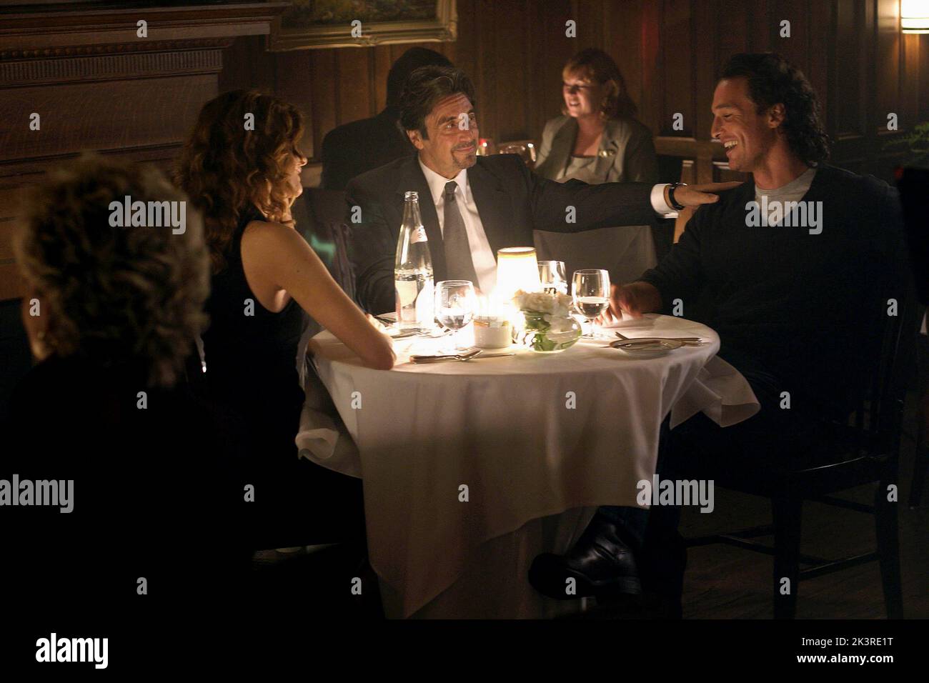 Rene Russo, Al Pacino & Matthew Mcconaughey Film: Two For The Money (2005) Characters: Toni Morrow,Walter Abrams & Brandon Lang  Director: D.J. Caruso 23 September 2005   **WARNING** This Photograph is for editorial use only and is the copyright of UNIVERSAL and/or the Photographer assigned by the Film or Production Company and can only be reproduced by publications in conjunction with the promotion of the above Film. A Mandatory Credit To UNIVERSAL is required. The Photographer should also be credited when known. No commercial use can be granted without written authority from the Film Company Stock Photo