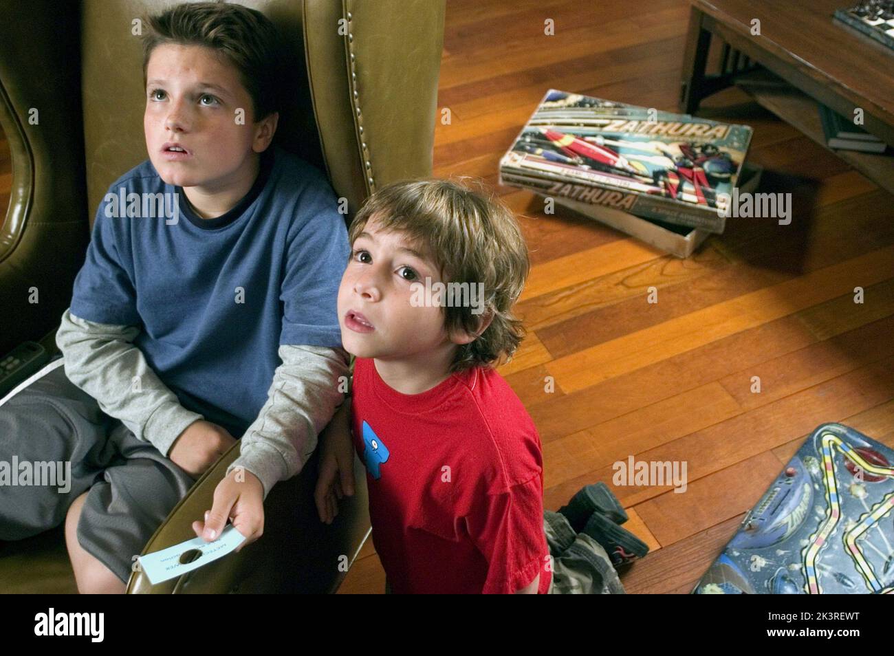 Josh Hutcherson & Jonah Bobo Film: Zathura (2005) Characters: Walter & Danny  Director: Jon Favreau 23 November 2005   **WARNING** This Photograph is for editorial use only and is the copyright of COLUMBIA PICTURES and/or the Photographer assigned by the Film or Production Company and can only be reproduced by publications in conjunction with the promotion of the above Film. A Mandatory Credit To COLUMBIA PICTURES is required. The Photographer should also be credited when known. No commercial use can be granted without written authority from the Film Company. Stock Photo