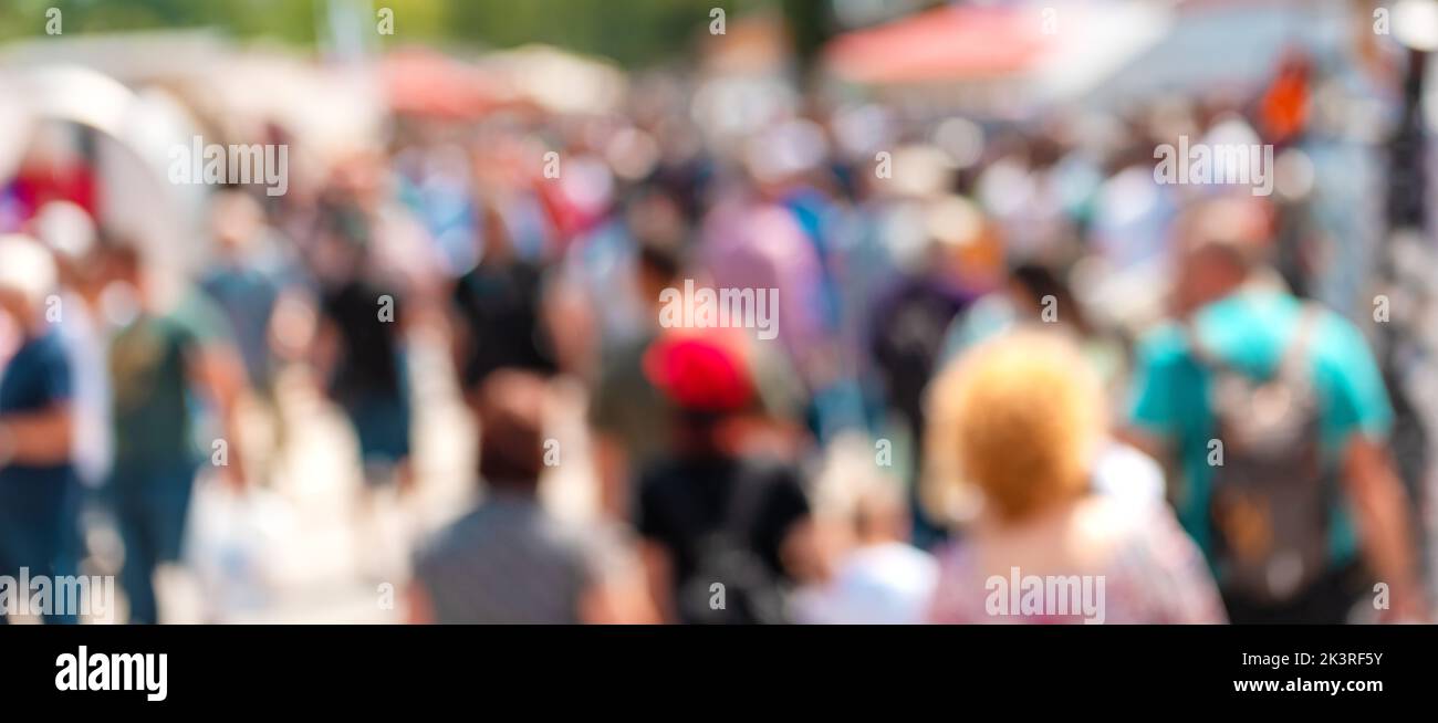 Population explosion concept, blur crowd of people on the street out of focus Stock Photo