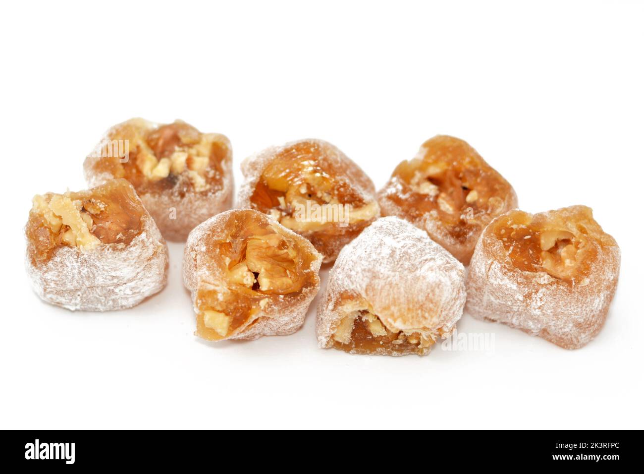 Arabian Egyptian taffy stuffed with walnuts, Eastern candy made as a