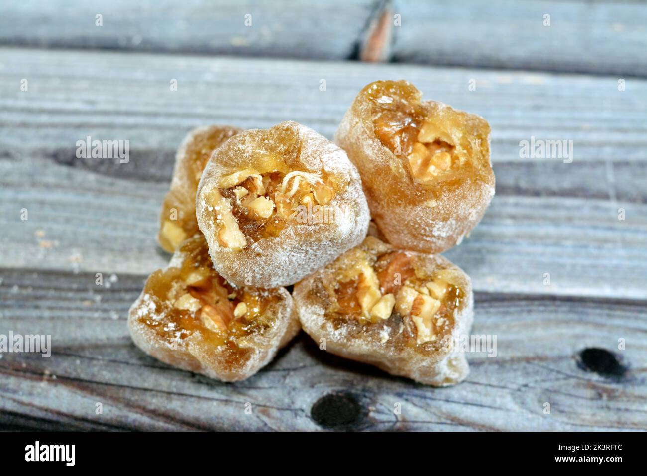 Arabian Egyptian taffy stuffed with walnuts, Eastern candy made as a