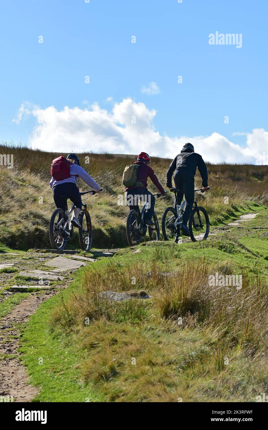 Mountain bikers, Haworth moor, Bronte Country, Autumn, West Yorkshire Stock Photo