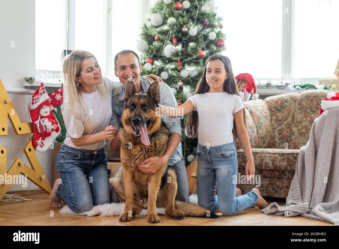 Man dog sitting near tree hi-res stock photography and images - Alamy