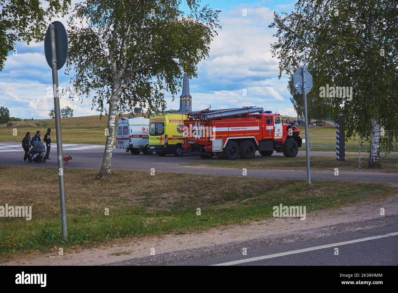 Russia, Borodino, September 2022. Three official cars, an ambulance, an intensive care unit and a fire department, are standing on the field in case o Stock Photo