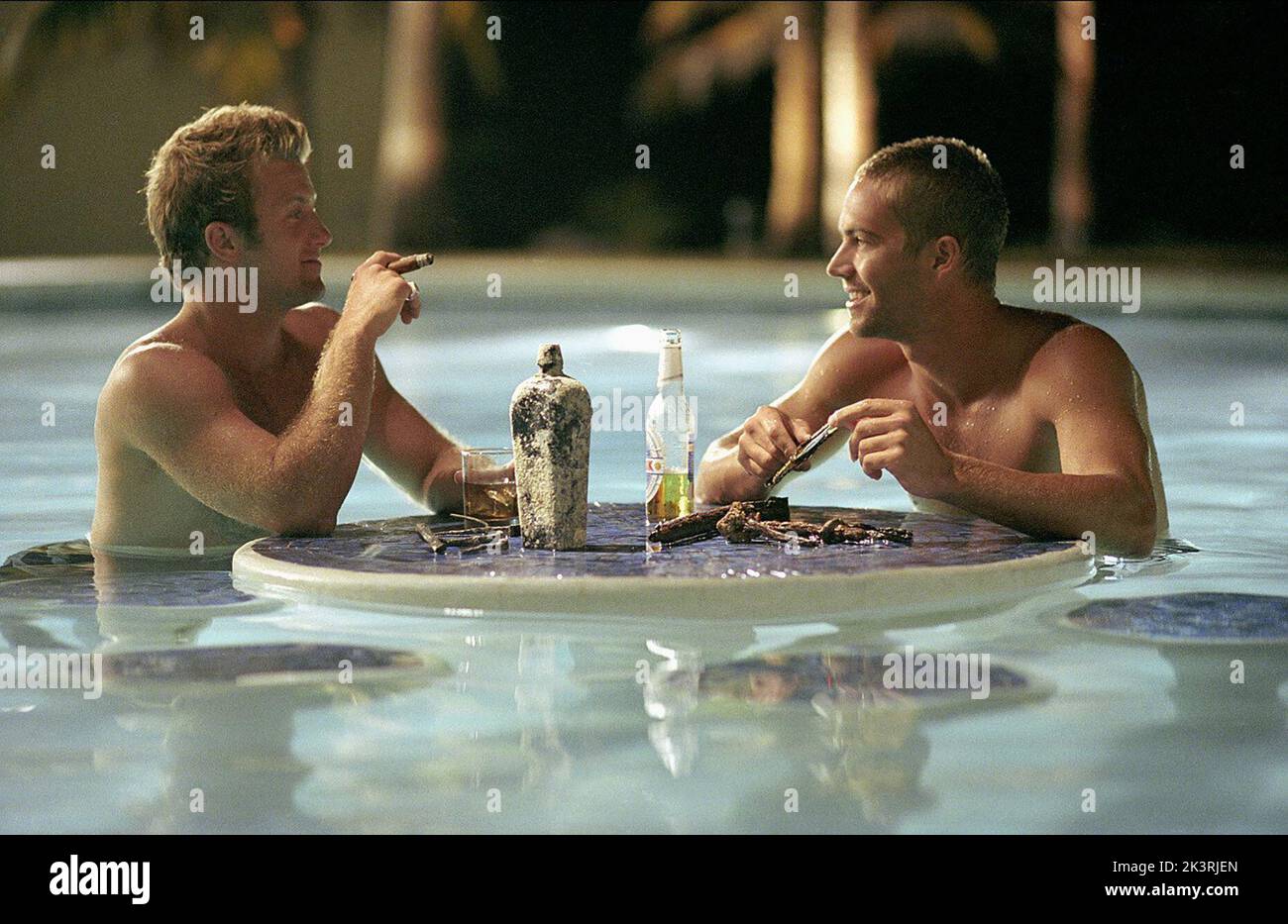 Scott Caan & Paul Walker Film: Into The Blue (USA 2005) Characters: Bryce & Jared  Director: John Stockwell 30 September 2005   **WARNING** This Photograph is for editorial use only and is the copyright of MGM and/or the Photographer assigned by the Film or Production Company and can only be reproduced by publications in conjunction with the promotion of the above Film. A Mandatory Credit To MGM is required. The Photographer should also be credited when known. No commercial use can be granted without written authority from the Film Company. Stock Photo